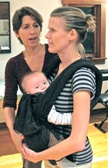 Mary Naden works with a mother and baby during an Alexander Technique lesson in Takoma Park, MD